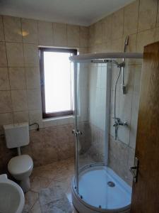 Ett badrum på Apartment Biograd na Moru 860a