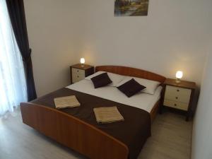 Giường trong phòng chung tại Apartments with a parking space Biograd na Moru, Biograd - 860