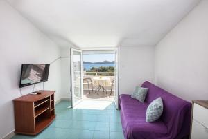 Televízia a/alebo spoločenská miestnosť v ubytovaní Apartment Biograd na Moru 863b