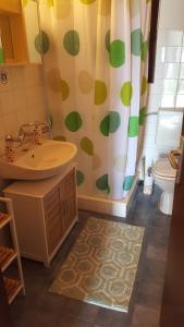 Koupelna v ubytování Apartment Sali 890b