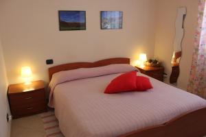 Ένα ή περισσότερα κρεβάτια σε δωμάτιο στο Il Pioppo