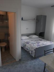 Posteľ alebo postele v izbe v ubytovaní Studio Medici 1045a