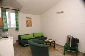 Posezení v ubytování Apartment Tisno 814c