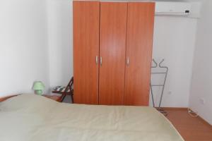 Postel nebo postele na pokoji v ubytování Apartment Tisno 814c