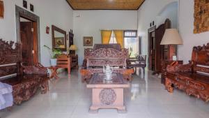 Un lugar para sentarse en Jeru Homestay