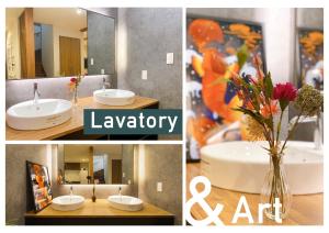 a bathroom with a sink and a vase of flowers at nestay villa tokyo shinjuku in Tokyo +34 photos