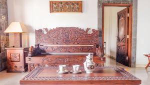 Un lugar para sentarse en Jeru Homestay