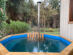 Πισίνα στο ή κοντά στο Cabana en Las Cascadas