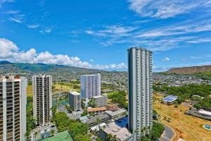 an aerial view of a city with tall buildings at Waikiki Sunset #2807 in Honolulu