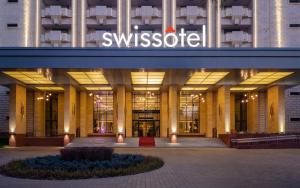 a building with the swissotel sign on it at Swissôtel Wellness Resort Alatau Almaty in Almaty