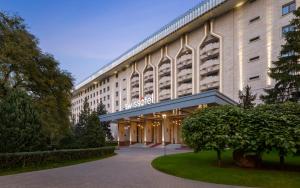 a rendering of the entrance to a hotel at Swissôtel Wellness Resort Alatau Almaty in Almaty