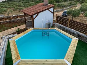 Bazén v ubytování Family friendly house with a swimming pool Hvar - 18890 nebo v jeho okolí