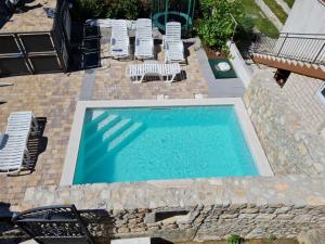 Bazén v ubytování Family friendly house with a swimming pool Selce, Crikvenica - 18895 nebo v jeho okolí