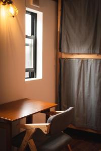 Posezení v ubytování Next Chapter - Guesthouse - Kito