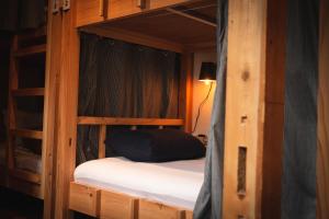 Postel nebo postele na pokoji v ubytování Next Chapter - Guesthouse - Kito