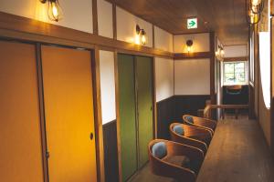 Posezení v ubytování Next Chapter - Guesthouse - Kito