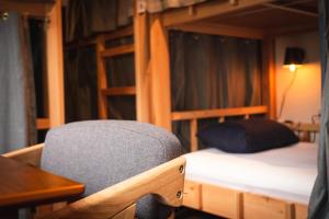Postel nebo postele na pokoji v ubytování Next Chapter - Guesthouse - Kito