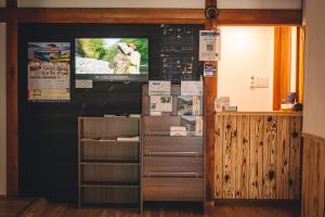 TV a/nebo společenská místnost v ubytování Next Chapter - Guesthouse - Kito