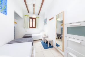 A bed or beds in a room at Es Cantonet