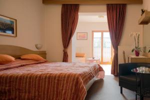 Postel nebo postele na pokoji v ubytování Hotel Sonne Sole