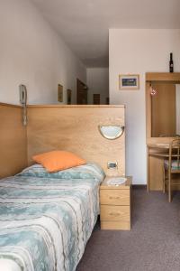 Postel nebo postele na pokoji v ubytování Hotel Sonne Sole