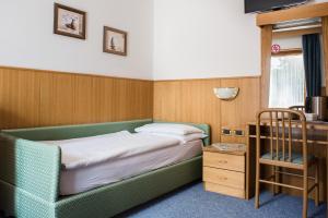 Postel nebo postele na pokoji v ubytování Hotel Sonne Sole