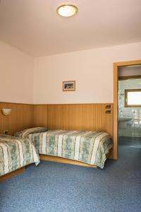 Postel nebo postele na pokoji v ubytování Hotel Sonne Sole