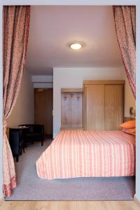 Postel nebo postele na pokoji v ubytování Hotel Sonne Sole