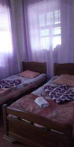 Ένα ή περισσότερα κρεβάτια σε δωμάτιο στο Gunter Guest house