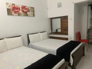 Letto o letti in una camera di Sobha Holiday Home