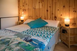 Łóżko lub łóżka w pokoju w obiekcie Suite Dúplex con terraza independiente