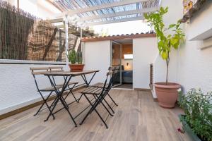 Patio lub wspólna przestrzeń na świeżym powietrzu w obiekcie Suite Dúplex con terraza independiente