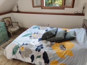 Katil atau katil-katil dalam bilik di Gîte du moulin de Vandon