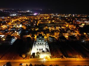 an aerial view of a city at night at Ritò in Gallipoli