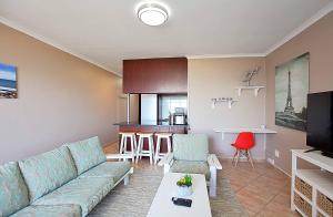 Posezení v ubytování Waves + 14 fotografií