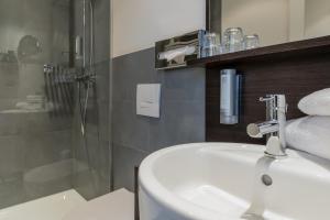 Koupelna v ubytování Garner Hotel Berlin - Spandau by IHG