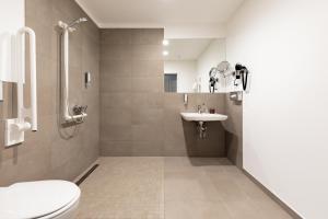 Koupelna v ubytování Garner Hotel Berlin - Spandau by IHG