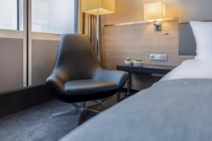 Postel nebo postele na pokoji v ubytování Garner Hotel Berlin - Spandau by IHG