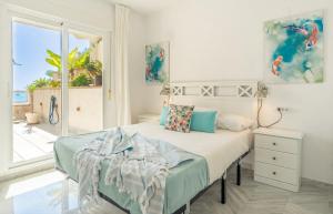 Ένα ή περισσότερα κρεβάτια σε δωμάτιο στο Coral Paradise Apartment with Swimming Pool +35 φωτογραφίες