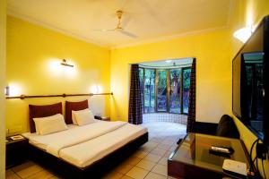 Postel nebo postele na pokoji v ubytování Treasure Island Resorts Lonavala