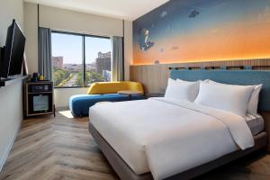 Krevet ili kreveti u jedinici u objektu ibis Styles Semarang Simpang Lima