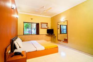 Postel nebo postele na pokoji v ubytování Treasure Island Resorts Lonavala