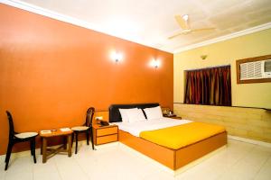 Postel nebo postele na pokoji v ubytování Treasure Island Resorts Lonavala