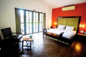 Postel nebo postele na pokoji v ubytování Treasure Island Resorts Lonavala