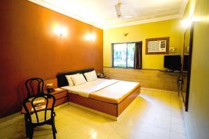 Postel nebo postele na pokoji v ubytování Treasure Island Resorts Lonavala