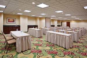 a conference room with tables and chairs in it at Holiday Inn Express Hotel & Suites Cleveland-Streetsboro by IHG in Streetsboro