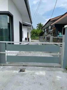 a blue fence in front of a house at Inderaloka Villa 23A Free Parking in Shah Alam