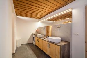 Koupelna v ubytování Unterlanpacher Historic Refugium + 29 fotografií