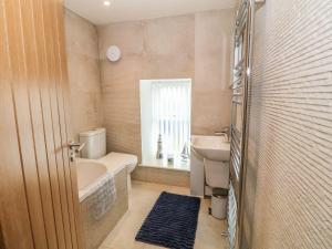 Koupelna v ubytování Fishermans Cottage + 27 fotografií