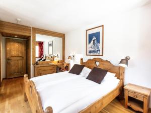Postel nebo postele na pokoji v ubytování Hôtel Magrappé